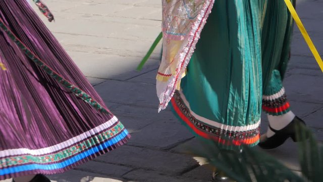 Close up of ballet folklorico shoes dancing in Typical celebration in Corfu festival. Traditional Costumes of Hellenic culture. Mediterranean folkore dance with mid cuban heels.