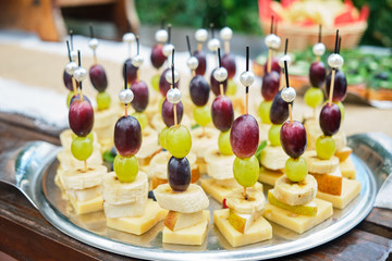 Fruit on skewers close up. Catering. Banquet