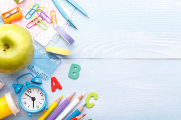 School stationery on blue background