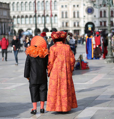 People masked during the Carnival party in Piazza San Marco in V