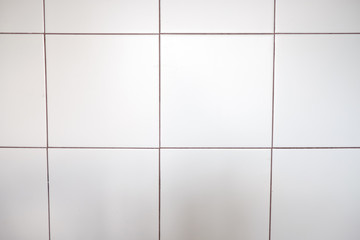 White ceramic glossy tile close up