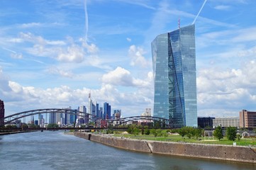 view of the river Main with the headquarters of ECB and the skyline of Frankfurt. European Central...