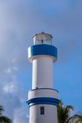 lighthouse on background of blue sky