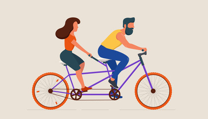 Man and woman riding tandem bicycle