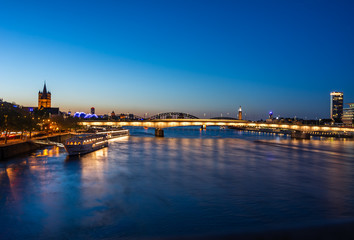 Fototapeta na wymiar Riverside of the river Rhine in Cologne at night