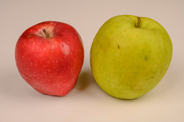 Ripe green and red apples on white background. Not isolate
