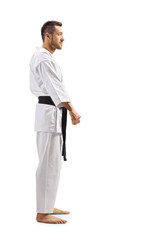 Karate man in kimono with black belt