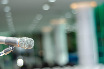Close up Microphone for broadcast karaoke or on stage. Mic is on stage in the conference room.