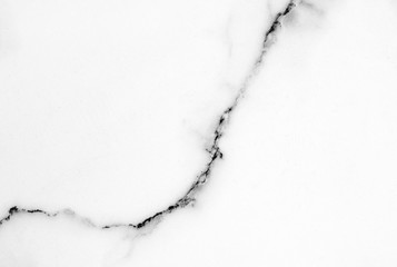White marble pattern with curly grey and black veins. Abstract texture and background