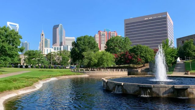 Charlotte NC skyline cityscape on a clear blue summer day as seen from Marshall Park