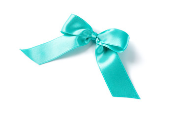 Turquoise bow isolated on white background. Gift concept