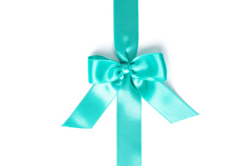 Turquoise ribbon with bow isolated on white background. Gift concept