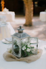 rustic lamp wedding decor, white flowers and burlap, country outdoor wedding wedding, reception decoration