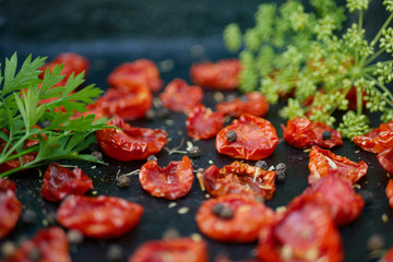 Tomatoes dried on baking tray. Preparation dried tomatoes