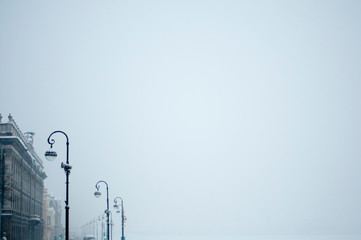 city Covered with snow. Lantern. Blizzard.