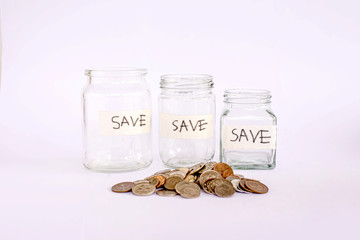 money and glass jar to saving concept