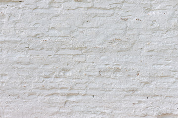 Old white whitewashed brick wall