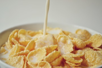 Cornflakes with milk. Helpful and quick breakfast.