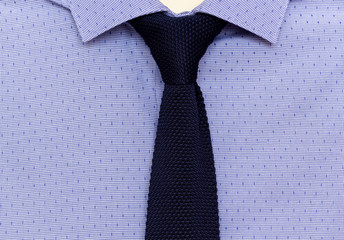 blue shirt and knit tie