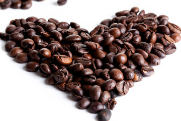Coffee beans in heart shape white background