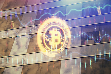 Multi exposure of cryptocurrency theme hologram drawing and city veiw background. Concept of...