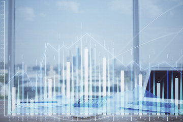 Forex Chart hologram on table with computer background. Multi exposure. Concept of financial markets.