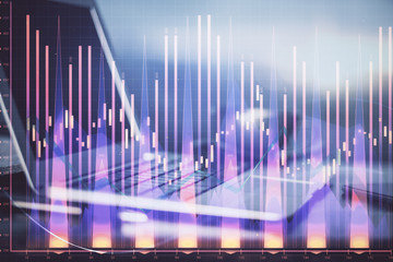 Financial chart drawing and table with computer on background. Double exposure. Concept of international markets.