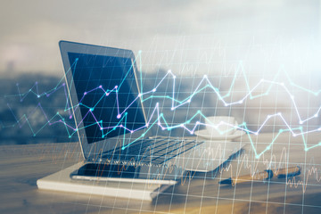 Multi exposure of forex graph and work space with computer. Concept of international online trading.