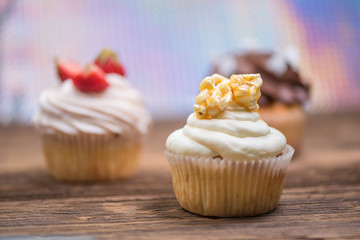 Sweet delicious colorful cupcakes for celebration