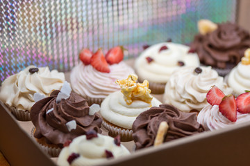 Sweet delicious colorful cupcakes for celebration