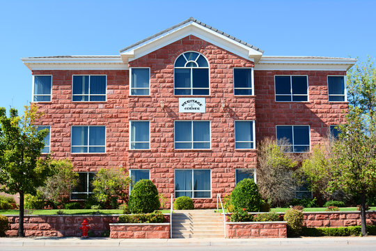 ST. GEORGE, UTAH - AUGUST 15, 2015: Heritage Corner Office Building. The three story, centrally located office building features the areas trademark red sandstone exterior.