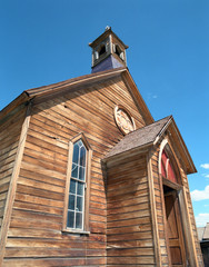 A weathered old church building stands in the ghost town of Bodie, California.