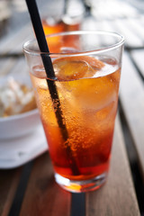 Spritz cocktail with nachos chips