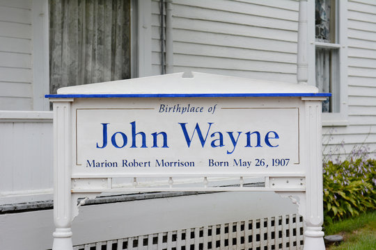 Sign at JohnWINTERSET, IOWA - AUGUST 20, 2015: Sign at the John Wayne Birthplace. On the grounds of the museum that opened to the public in May of 2015.Wayne Birthplace