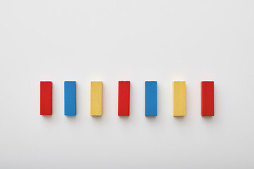 Wooden blocks of various color at workplace of financial manager