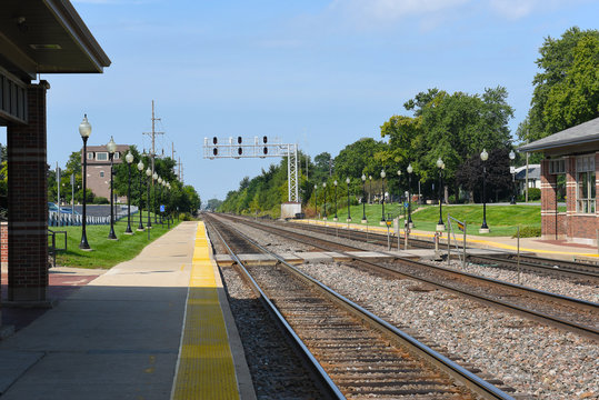 WESTMONT, ILLINOIS - SEPTEMBER 5, 2016: Westmont train platform. The station on Metra's BNSF Railway Line in Westmont, Illinois, is 19.4 miles from Union Station.