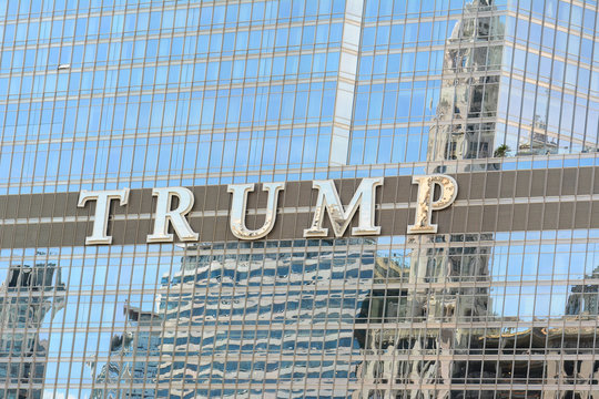 CHICAGO, ILLINOIS - AUGUST 22, 2015: Trump Tower sign. The Trump International Hotel and Tower, aka Trump Tower, is a skyscraper condo-hotel in downtown Chicago, Illinois. 