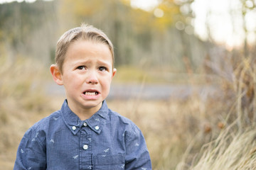 Little boy outdoors crying © Brett