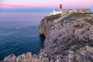 Fototapeta na wymiar Sunrise over historic lighthouse in Sagres, Portugal