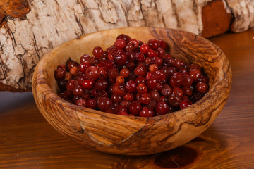 Traditional soaked cowberry in the bowl
