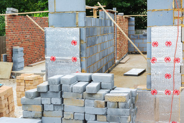 Renovation projects. Building of extension of the existing house, insulated brick walls, selective focus