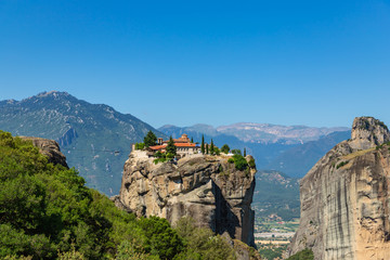 The Meteora is a rock formation in Greece hosting one of the largest and most precipitously built...