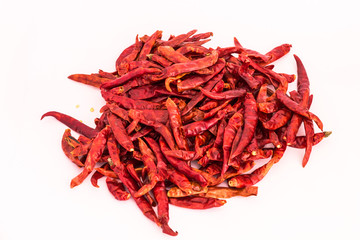 Dried red chili or chilli cayenne pepper isolated on white background