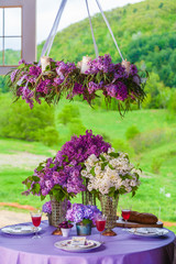 Floral bouquet in a barn setting.