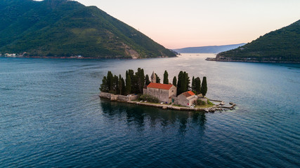 Aerial view of small islands of Ostrvo and Sveti Juraj monastery in the bay of Kotor, Montenegro