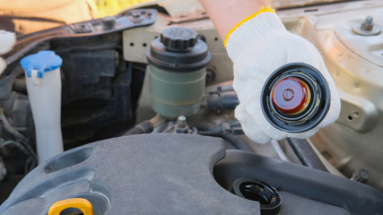 The cover oil filler neck of the car