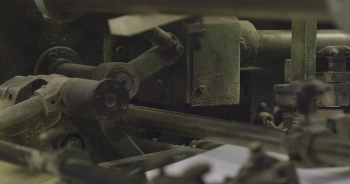 Footage of the printing process of the book.