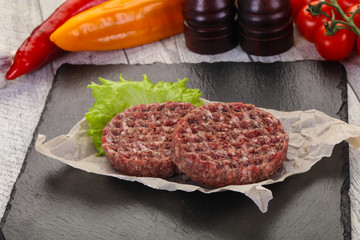 Raw burger cutlet
