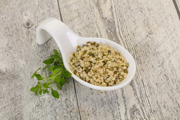Peeled hemp seeds in the bowl