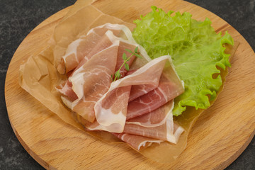 Italian prosciutto pork meat over board